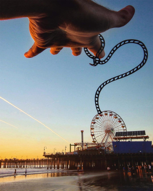 archiemcphee:  Meanwhile London-based artist Rich McCor, aka paperboyo (previously featured here), continues to travel the world using simple paper cutouts to cleverly transform famous landmarks and other buildings into awesome new attractions. Suddenly