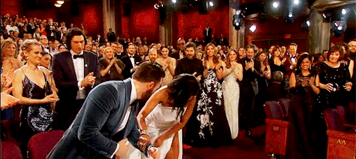 bundibird:wrangletangle:stevenrogered:Chris Evans helps Regina King up the stairs to the stage after