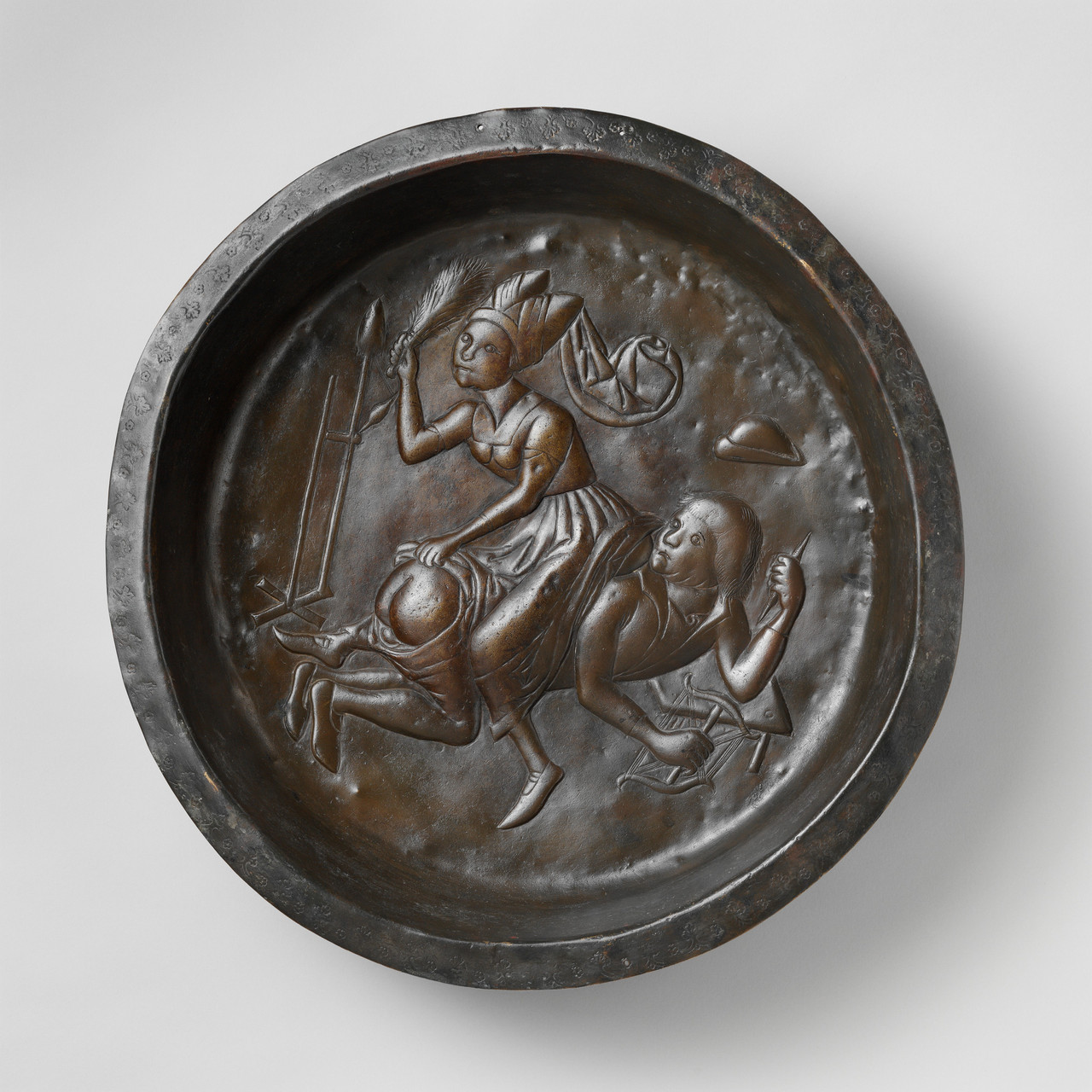 historyarchaeologyartefacts:Plate with Wife Beating Husband, Made in Dinant or Malines,