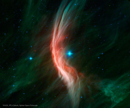 Zeta Oph: Runaway Star: Like a ship plowing through cosmic seas, runaway star Zeta Ophiuchi produces