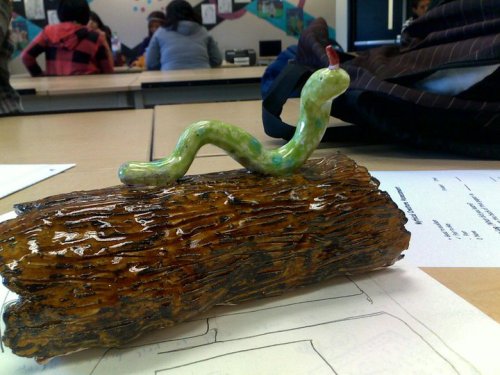 ackanime:  0scharlachrot0:  ota-con:  theladylillibet:  snapchatting:  in 11th grade art we had to make mythical creatures with clay but i didn’t want to do that so i made a log and added a lil worm friend on top of it but my teacher got mad and said