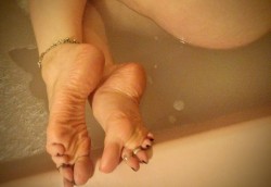 sweetcandytoes:  sweetcandytoes:A nice foot, leg, and ass tease in the bath! Again, older stuff until tomorrow. But perhaps the new folks won’t mind.And because, although she is too shy to admit it, Candy is also a leg and ass goddess…