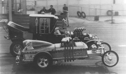 atomic-flash:  The Munster Koach vs. DRAG-U-LA - Featured in The Munsters episode, Hot Rod Herman. Both designed by George Barris and built by Barris Kustoms in 1964.