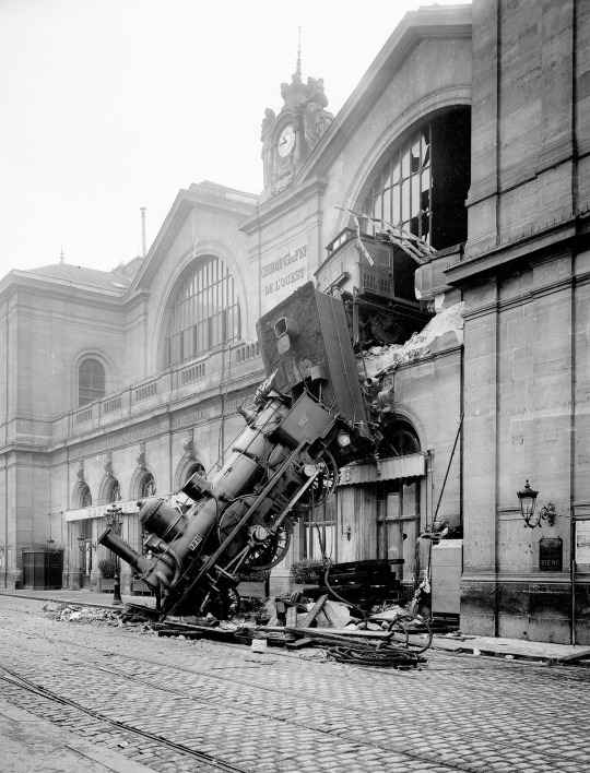 arjan-de-lumens: musicalfirefighting:  argumate:   this post is a train wreck.  I recognize this picture - maybe it’s from the clock robot movie?   It’s from the Montparnasse derailment, a train wreck that took place in Paris in 1895. Here is a picture