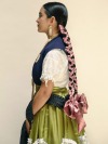 tierras:Guelaguetza hairstyles by Netzahualxochitl Huerta featured in Vogue México
