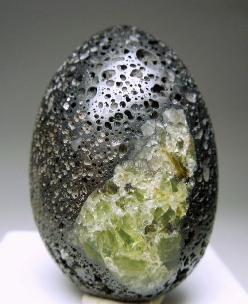 gorgeousgeology:Peridot in Volcanic Lava by AllofHerStones on Etsy