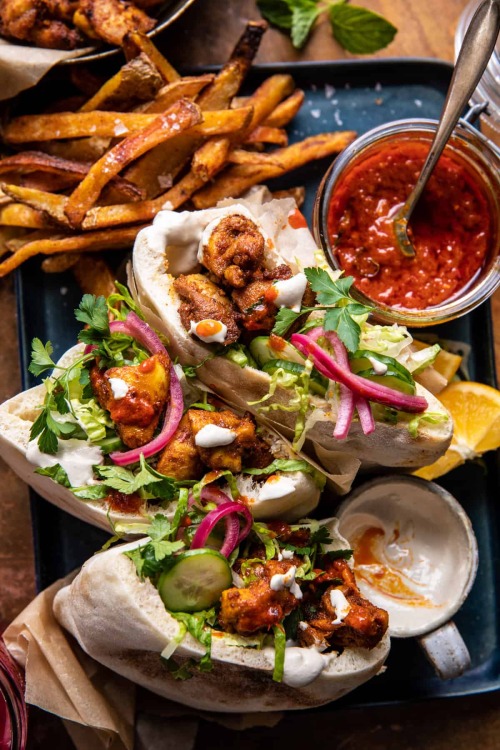 Roasted turmeric chicken pitas with garlic lemon tahini