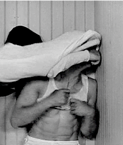railwayshoes:Buster Keaton is hindered by Ed Brophy as he attempts to undress in The Cameraman.