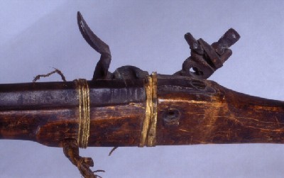 An extremely rare and unique flintlock rifle with original powder flask and kit, originates from the