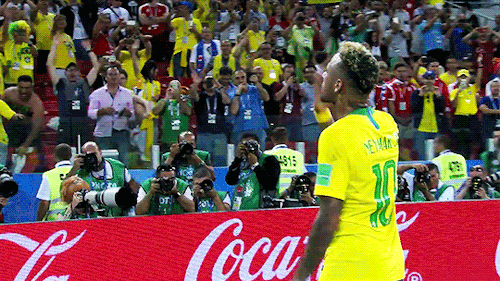 neymarjrs:Neymar Jr greets his son in the crowd after Brazil qualifies for the Round Of 16 during the 2018 FIFA World Cup.