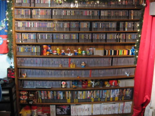 toploaderleo:  This is my game room. I have a pretty good sized collection for a broke ass college student. When my life’s a little less busy I’m going to upload images of certain items in my collection with a little bit about them. Not just boring