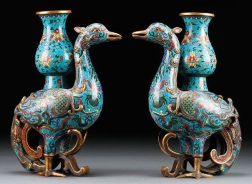 A pair of Chinese Ming-style figural bird form bases. In enameled and gilt bronze depicting two stan