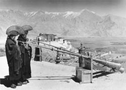 historicaltimes: Tibetan monks playing the dungchen at Jagpori Hill, Lhasa, 1938 via reddit 