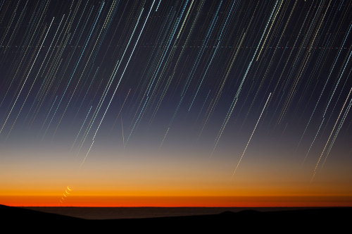 Sunset and MoonsetThis striking new image shows ESO’s Paranal Observatory in Chile soon after sunset