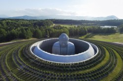 sixpenceee:  A hidden buddha surrounded by a hill of 150,000 lavenders. Located on the outskirts of Sapporo,Japan. Pictures taken by Shigeo Ogawa. 