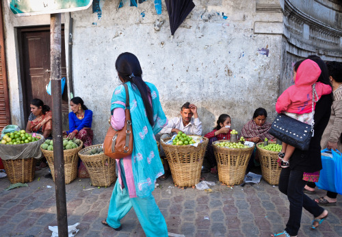 People selling fruit outside Kathmandu Durbar Square in Basantapur, Kathmandu, Nepal. After this sho