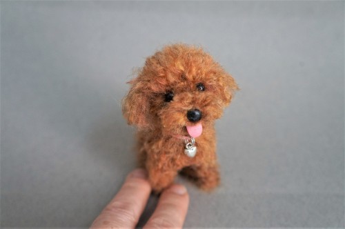  I hope everyone has a great smile this weekend!A pair of needle felted puppies. 