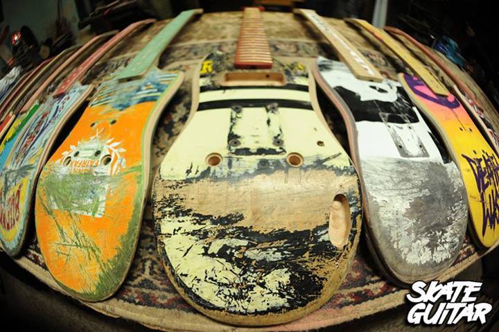 gaksdesigns:  Guitars made from recycled skateboards.  