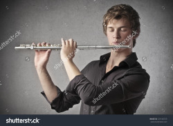 woodwindstockphotos:  this image is titled “blond boy playing a clarinet” 