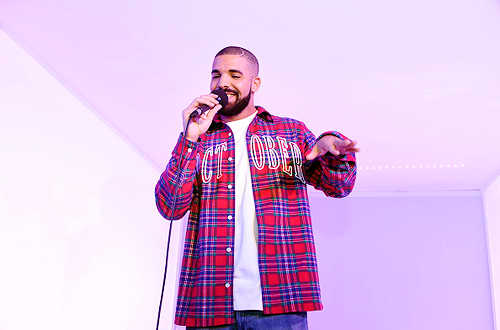 celebritiesofcolor:   Drake performs before the game between the Toronto Raptors and the Cleveland Cavaliers on November 25, 2015 at the Air Canada Centre in Toronto, Ontario, Canada. 