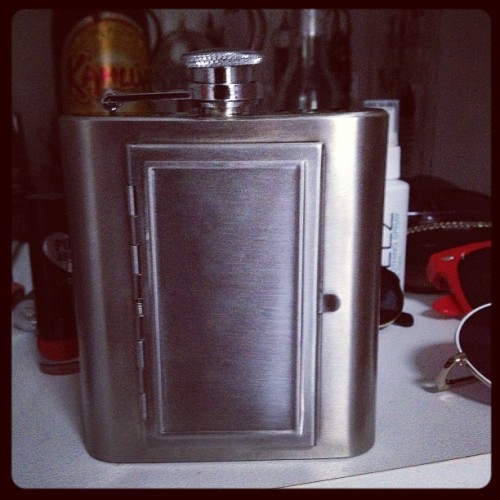 I have finally procured the perfect flask! Notice the little door on the front? A compartment for cigarettes. A true musicians friend 