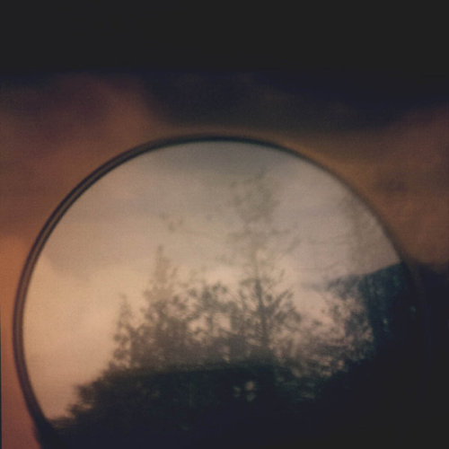 hanankazma:   Luna (night of the wolf)   Phoneography, shot with my phone through a drinking glass, heavily edited. process greatly enjoyed.    Hanan Kazma 
