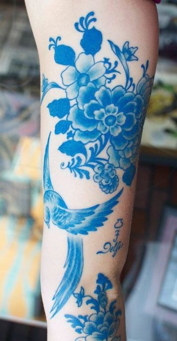 tats-amazink:  Blue tattoo by artist Sir Lexi Rex
