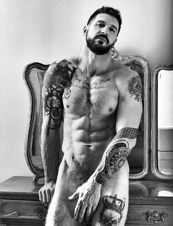 Nude men tattooed Category:Men with