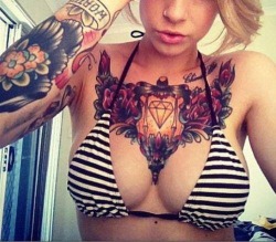 sllim67:  Inked boobies… 