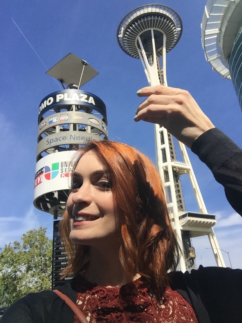 @feliciaday: Least successful picture with the Space Needle ever. ITS A TORCH OK?! Whatever. See u at the signing tonight Seattle. Or at PAX over the weekend. Somewhere. I’ll leave now