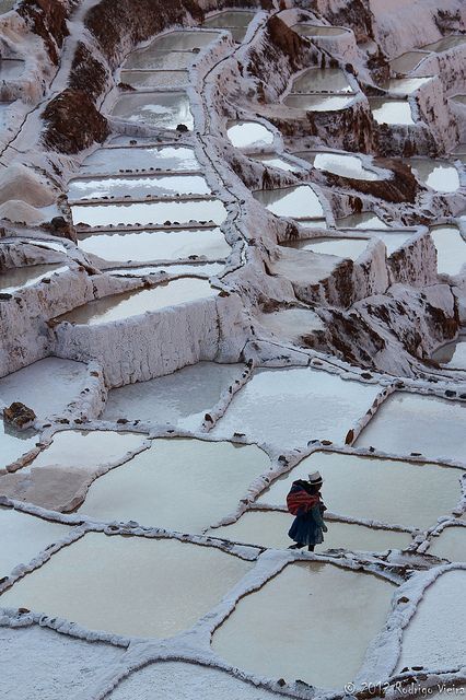 sixpenceee:This is a salt evaporation pool in Peru. Salt evaporation ponds are artificial ponds desi