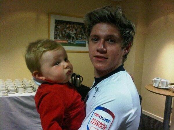 direct-news:  Niall with Derby footballer Ben Davies’ son. (August 31) 