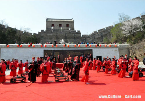  On April 11, the two came together as 21 married couples celebrated a traditional Chinese wedding c