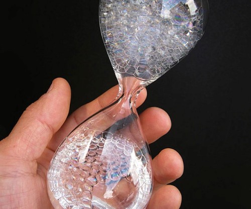 awesomeshityoucanbuy:  Soap Bubble HourglassDefy the laws of physics as you create the illusion of liquid traveling in reverse with the soap bubble hourglass. Upon being flipped, the soapy water creates hundreds of little bubbles that flow back and forth