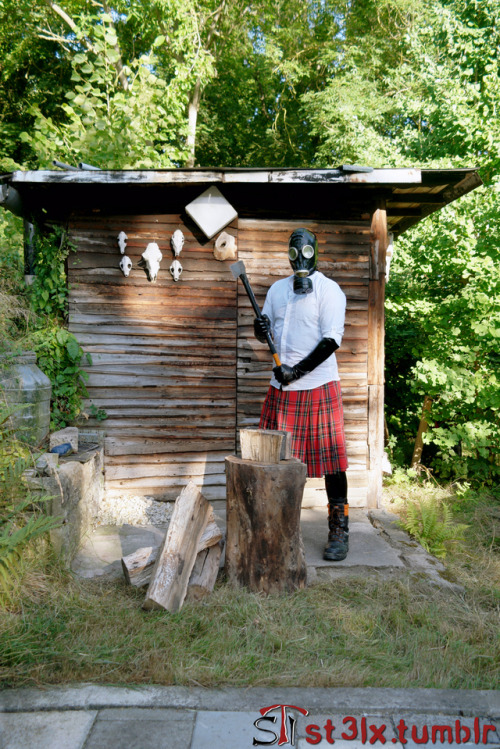 The Rubber Highland Games 2018 - Part 6 of 7Rubbered husband chopping wood in the garden