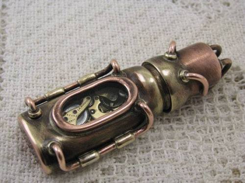wickedclothes:   Steampunk USB Flashdrive This steampunk flash drive will hold 32 GB of data. This item lights up and is waterproof, for storage needs in any situation. Sold on Etsy.