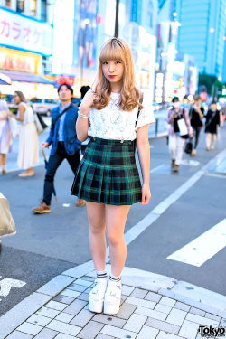 tokyo-fashion:  19-year-old Manameru (Twitter/Instagram) on the street in Harajuku wearing a Morph8ne top, plaid skirt, and YRU platform sandals with striped socks. 