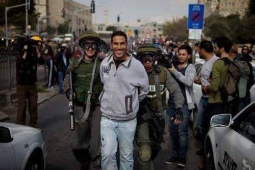 turana-mahrunisa:  Have you ever seen people smiling while being arrested? They are the Palestinians.  Why?  Because they have done their role and achieved their mission.. They deserve to smile… and their smile fears and trambles their occupiers and