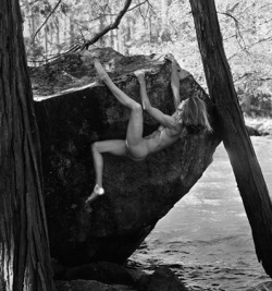 Nude rock climbing.