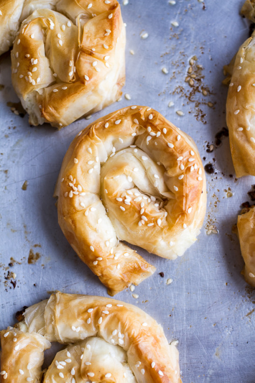 sweetoothgirl:Goat Cheese Stuffed Phyllo Swirls with Pomegranate Honey + Pistachios