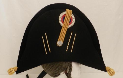 The bicorne hat, so named because of its two horns, is a descendent of the tricorne. Though the bico
