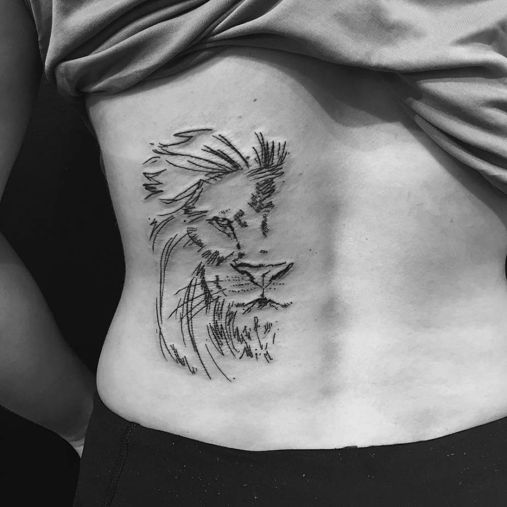 Sketch work style lion tattoo on the lower back.... - Official Tumblr page  for Tattoofilter for Men and Women