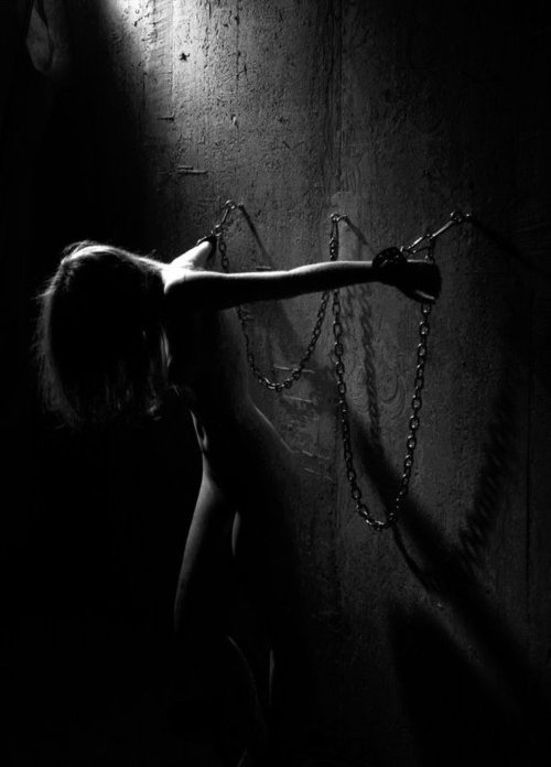 XXX Chained to the wall photo