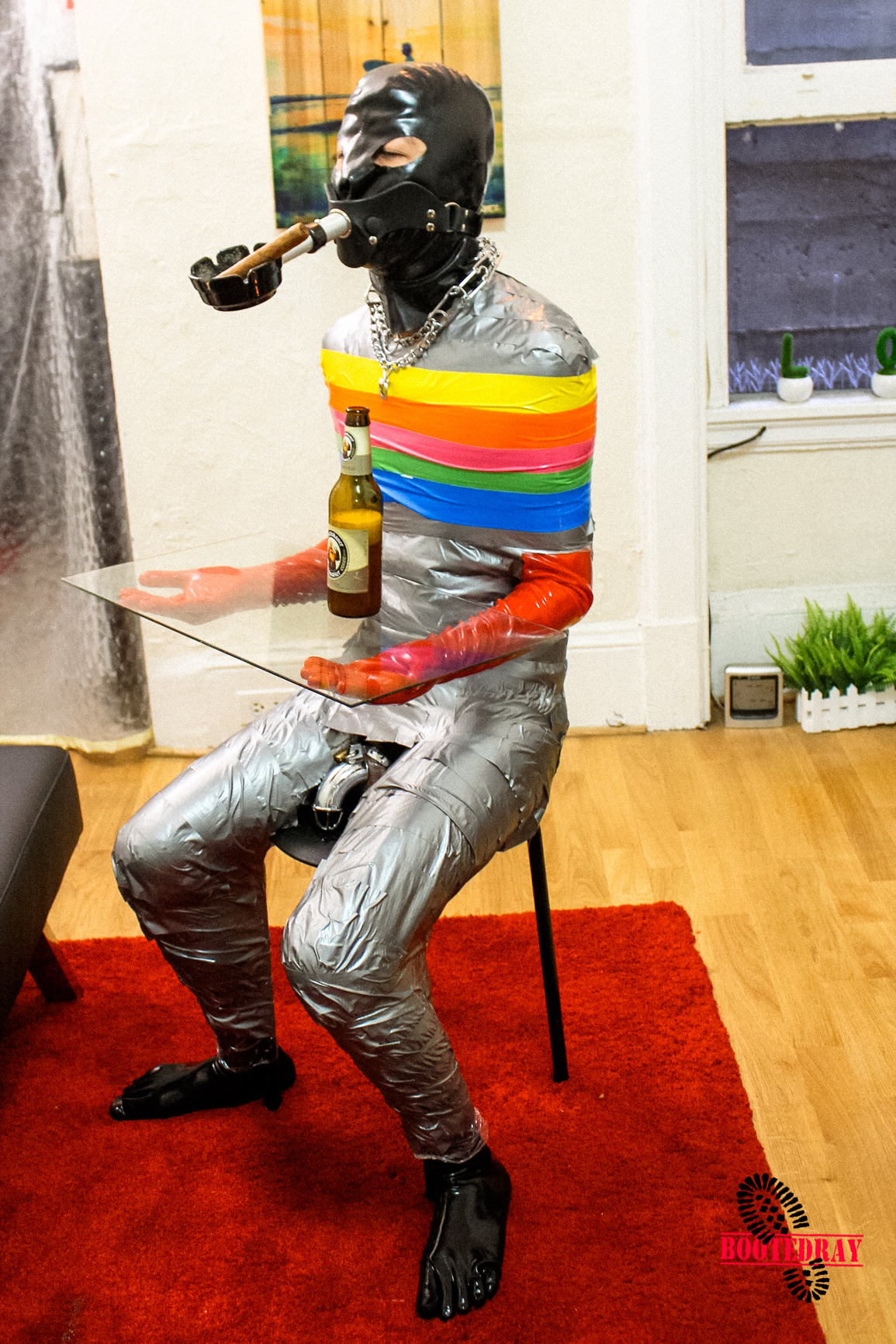 bootedray:  Human Table https://bootedray.com/my-pics/human-table-duck-tape/ 