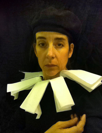 anticonfluentialist-deactivated:  While in the lavatory on a domestic flight in March 2010, I spontaneously put a tissue paper toilet cover seat cover over my head and took a picture in the mirror using my cellphone. The image evoked 15th-century Flemish