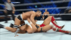 Inverted Cesaro crotch to the face of Bryan