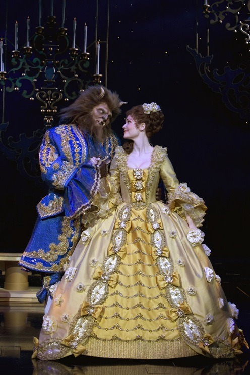 Four Different Designs For Beauty And The Beast (Disney Version):They All FeatureBelle In A Blue, Aproned
