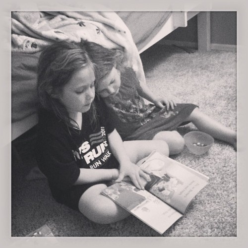 Part of our nightly routine now. Big sis reads a book or two to little sis before mama reads at bedt