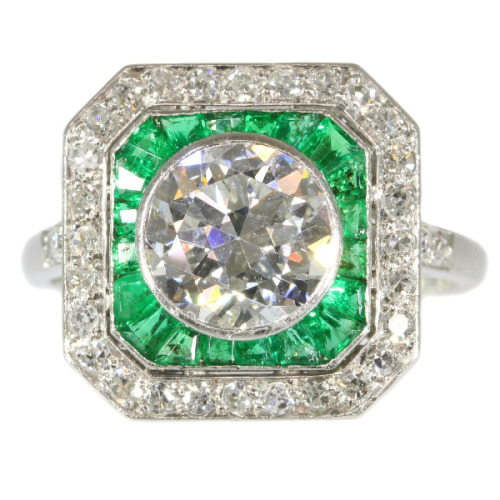 Roses are whiteEmeralds are greenAnd this ring is one to be seen  This splendid Art Deco ring radiat
