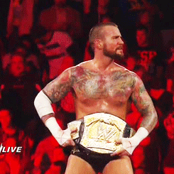 nerdyandbritish-deactivated2014:  CM Punk celebrates retaining the WWE Championship